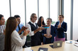 © NVB Stocker - happy birthday party : Business Hispanic man celebrating birthday and doing a party with colleagues. Multi-Ethnic Coworkers are Celebrating a Birthday Party in the Office.
