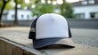 © RulArt - Trucker hat cap flat visor with black and white color in outdoor, ready for your mock up design