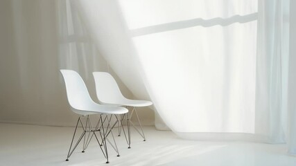 Aufkleber - Two chairs placed in front of a window with blurred background