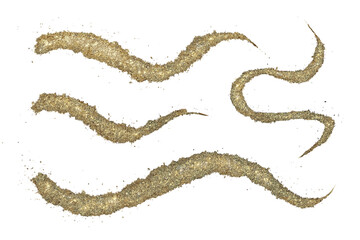 Poster - Golden sand designs creating abstract shapes and patterns on a white background for artistic expression and creativity