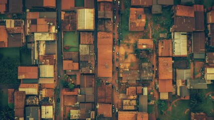 Poster - Aerial view of a city with many buildings and streets, ideal for use in urban planning or infrastructure projects