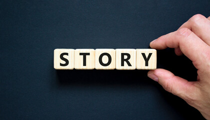 Fototapete - Story symbol. Concept word Story on beautiful wooden blocks. Beautiful black table black background. Businessman hand. Business lifestyle story concept. Copy space.
