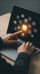 Aufkleber - Hands interacting with laptop screen displaying online store icons, showcasing e-commerce and digital marketing concept