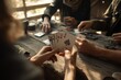 © Vitalii Shkurko - Group of friends gather around a rustic table in a cozy cabin, engaged in an exciting card game. Laughter and friendly competition fill the air as they enjoy each others company