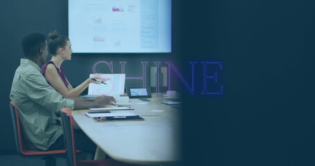 Poster - Analyzing graphs professionals gesturing at laptop, tablet, documents in meeting room, copy space