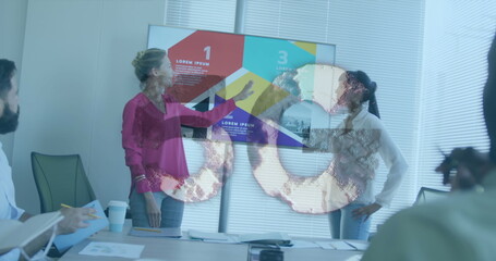 Poster - Gathering four professionals in business attire around table in boardroom with display screen