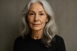 © Jelena - Beautiful middle-aged woman portrait with elegant gray hair created using advanced digital artistry and professional photography techniques