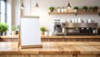 © tong4130 - Blank small sign on wooden cafe counter