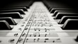 © Mursid - Close-up piano keys with sheet music