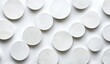 © Kaharuddin - White circles arranged in a pattern on white background