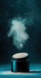 © qohhar - Powder explosion from dark teal jar