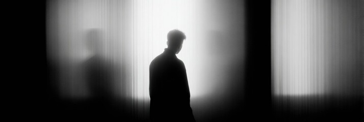 Aufkleber - Shadow Figure Stands Behind Translucent Screen, Creating a Mysterious Atmosphere in a Dimly Lit Space During the Evening
