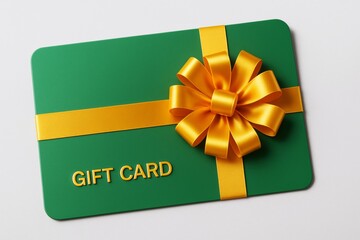 Poster - Green gift card with golden satin ribbon and bow on white background representing festive business concept and holiday celebration.