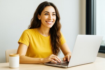 Aufkleber - Smiling young woman working on laptop in bright modern interior with natural light background, enjoying relaxed remote work lifestyle concept.
