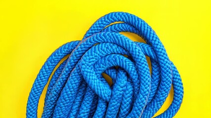 Poster - A simple and colorful rope on a bright yellow background