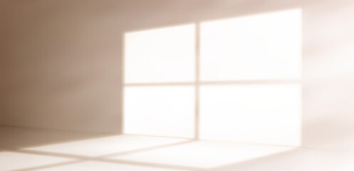 Poster - Soft window shadow on wall - natural sunlight casting geometric pattern through glass panes. Minimal interior bg with warm morning glow for home decor, product display or peaceful space concept.