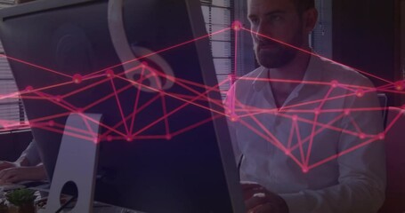 Poster - Senior office worker typing on keyboard and activating red network overlay for data monitoring