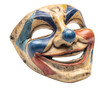 © Alice a. - Vintage clown mask wooden texture colorful painted face blue nose red and blue geometric patterns smiling expression isolated on transparency background evokes eerie and playful feelings