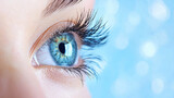 Close up blue eye with long eyelashes, natural skin, eyebrow, and soft bokeh background, futuristic digital feel