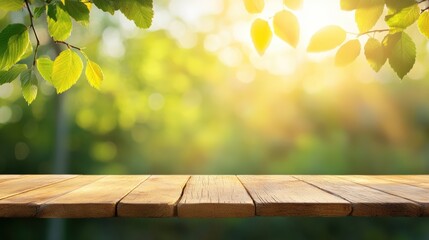 Poster - Wooden table surface with green leaves and sunlight in a blurred natural background.