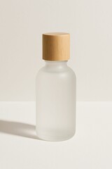 Poster - Frosted glass bottle with wooden cap on minimal beige background
