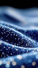 Poster - Close-up of abstract textured surface covered in small reflective spheres, creating a flowing wave pattern