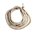 © julien.habis - A coiled rope lasso with knot, ready to throw, isolated on a empty plain background