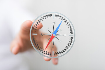 Aufkleber - SEO-friendly image of a hand holding a digital compass, ideal for business, navigation, and direction concepts.