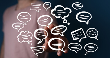 Hand interacting with floating speech bubbles,communication, feedback, ideas.