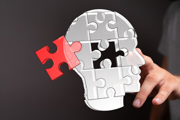 Aufkleber - Unlocking potential.  Conceptual image of a human head as a puzzle.
