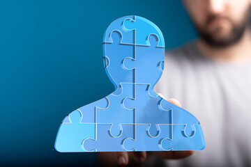 Aufkleber - Abstract puzzle person figure. Teamwork, collaboration, connection, unity concept.