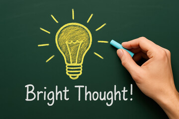 Poster - A creative concept emerges as a draws a glowing lightbulb to symbolize innovation and inspiration in business