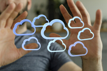 Poster - Person visualizing cloud technology, data storage, and network concepts.