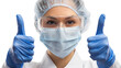 © Justlight - Female doctor wearing a surgical mask, goggles, hair net, and blue gloves is confidently gesturing a thumbs up sign, isolated on a transparent background for a clean, professional look
