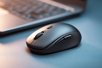 Poster - Wireless computer mouse on a desk with a laptop in soft lighting during a quiet workspace setting