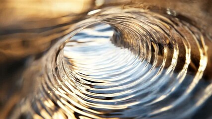 Poster - Water Tunnel: A mesmerizing image captures a unique perspective through a water tunnel, where light and ripples create a captivating display of the natural world.