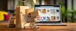© MP Studio - The shopping cart filled with packages in front of a laptop screen.