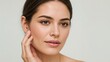 © mattegg - Woman face skincare touching cheek isolated neutral background