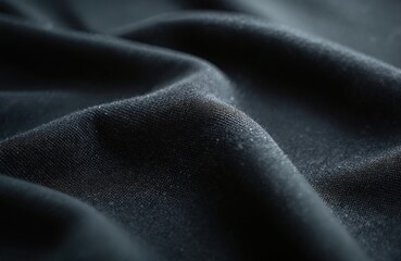 Poster - Close-up view black sports jersey fabric. Smooth textile cloth texture. Black material background for football shirts, apparel, t-shirts. Details, tech, mesh, pro design, fashion background.