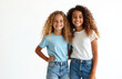 © miss irine - Two young, pretty teenage girls friends with blond, brunette curly hairs posing cheerfully against white backdrop. Beautiful, diverse young females smile. Lifestyle concept of happiness, joy,