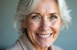© Pete - Portrait of beautiful smiling senior woman with white hair. Attractive woman, 50s, 60s with eyeglasses. Pensioner is happy at home in retirement. Positive emotions.