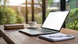© NKFrame - Laptop on Wooden Table with Blank Screen, Cozy Workspace, Coffee, Notebook, Pen, Outdoor View, remote work Remote work
