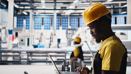 Poster - engineer using laptop to monitor solar panel plant assembly lines, troubleshooting photovoltaic equi