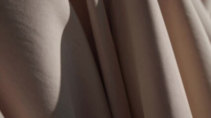 Poster - Soft beige fabric with gentle folds and natural light evokes serene, minimalistic, calming atmosphere, smooth texture