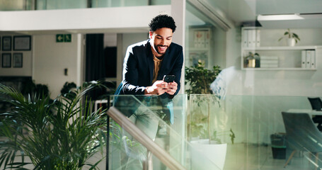 Poster - Business man, happy and texting at startup with smile for contact, lead or notification at office. Person, smartphone and excited with mobile app, chat or deal for funding approval at creative agency
