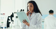 © peopleimages.com - Thinking, woman and scientist in laboratory with tablet for medical research, ideas or study. Digital technology, planning and female microbiologist with bacteria report for pharmaceutical innovation