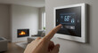 © Iuliia - Hand pointing on digital thermostat with screen display set at 68 degrees Fahrenheit. Temperature regulator on wall within living room or office. Smart home climate control regulation. Selective focus