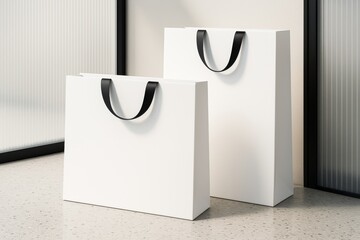 Poster - Blank white shopping bags with black handles placed on clean indoor background for branding and promotional design mockup template concept.