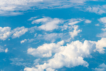 Wall Mural - Clouds at the sky. Cloudscape - Blue sky and white clouds. Beautiful blue sky background with clouds. White fluffy clouds in the blue sky. Blue sky and white clouds of daytime