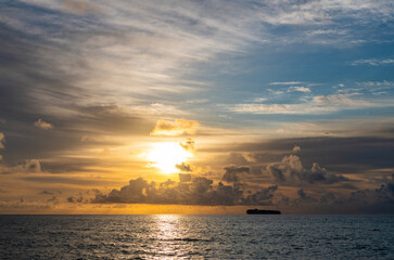 Wall Mural - Calm horizon at sea nature. Romantic summer vacation on beach seascape. Sunrise sky horizon. Sea sunset view. Cloudy sunset sky and seascape at summer vacation. Skyscape with sea sunrise. Afterglow